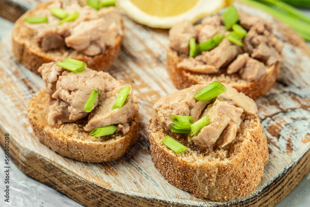 Sandwich with cod liver on rye bread. Healthy food concept. Food recipe background. Close up Sandwich with cod liver on rye bread. Healthy food concept. Food recipe background. Close up