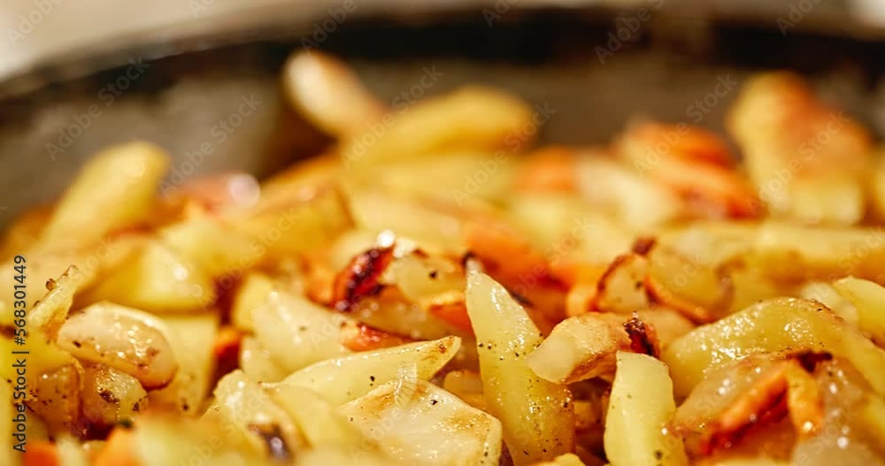Cooking Fried Potato on Frying Pan Cooking on Vintage Gas Stove. Slow motion 60 fps 4K 10 bit Cooking Fried Potato on Frying Pan Cooking on Vintage Gas Stove. Slow motion 60 fps 4K 10 bit