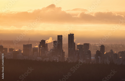 Modern City Skyline in Downtown Vancouver, British Columbia, Canada. Golden Winter Sunrise Sky.