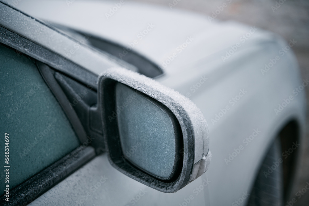 side view mirror covered with hoarfrost. frosty morning side view mirror covered with hoarfrost. frosty morning