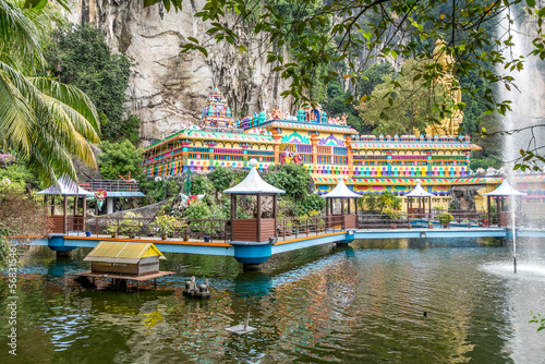 Photography Pond with a fountain n front of  the Batu Caves, Kuala Lumpur, Malaysia
