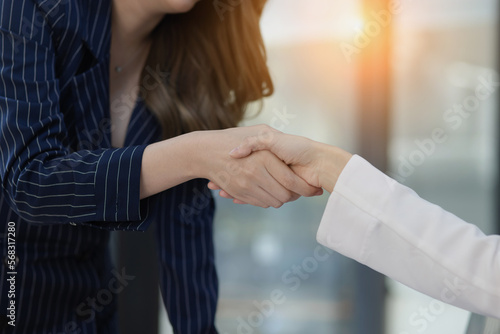 Business woman handshake, Concept of business partnership meeting.