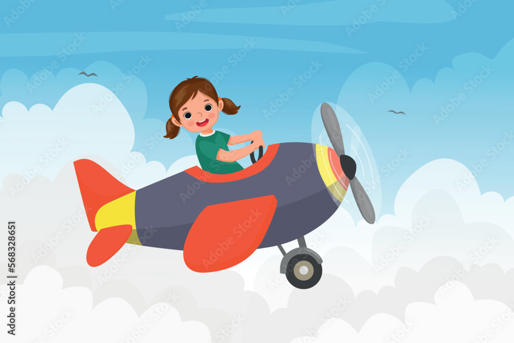 cute little girl flying an airplane in the blue sky
