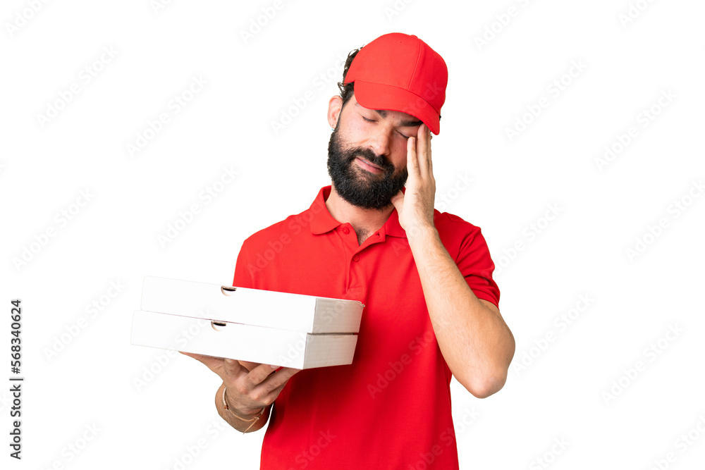 Pizza delivery man with work uniform picking up pizza boxes over isolated chroma key background with headache Pizza delivery man with work uniform picking up pizza boxes over isolated chroma key background with headache