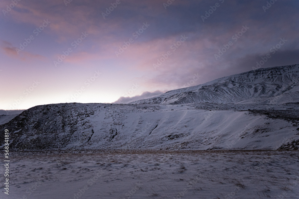 Iceland winter sunset landscape with snow in Múlaþing