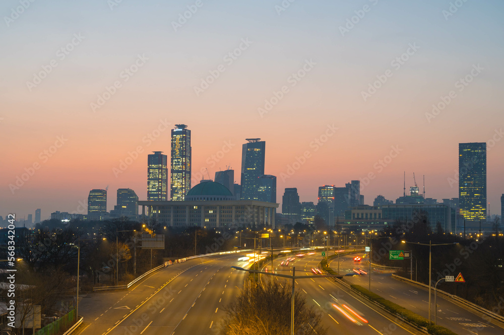 A vehicle passing through downtown in morning , at Seoul City. South korea.