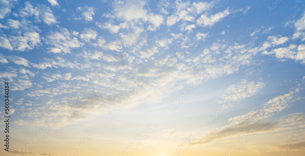 the bright blue sky and fluffy white altocumulus clouds, nature phenomenon sky panorama background.