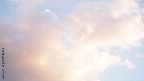 Low angle lockdown shot of clouds moving in sky