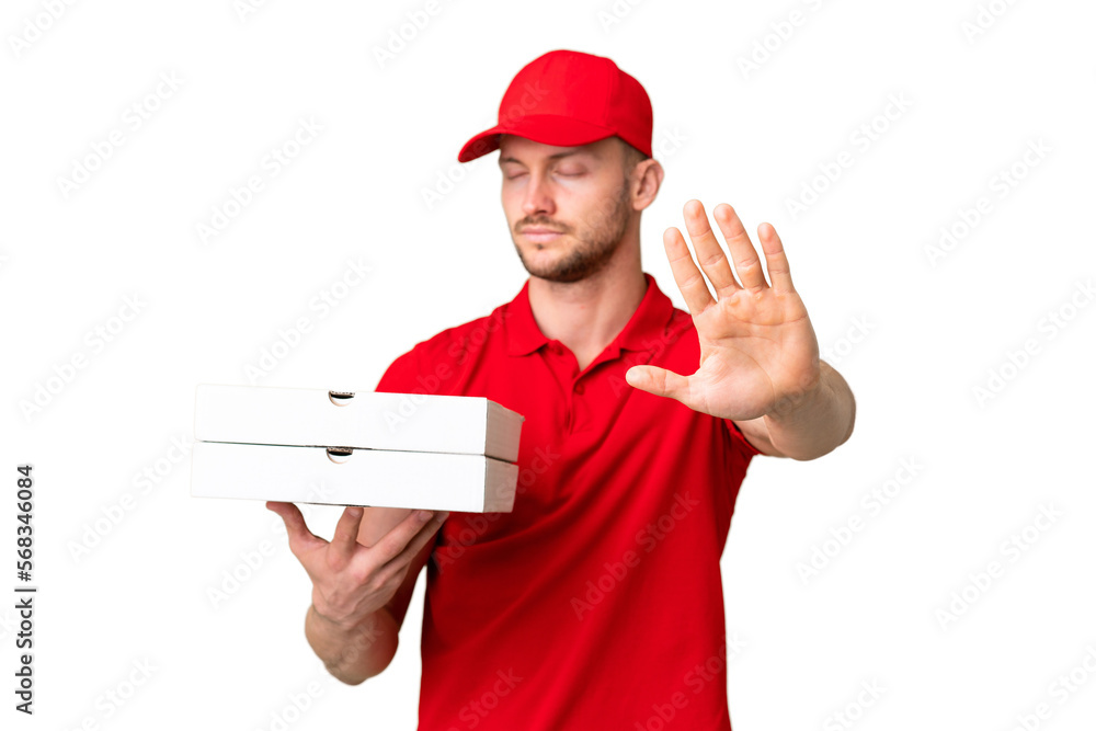 Pizza delivery man with work uniform picking up pizza boxes over isolated chroma key background making stop gesture and disappointed Pizza delivery man with work uniform picking up pizza boxes over isolated chroma key background making stop gesture and disappointed