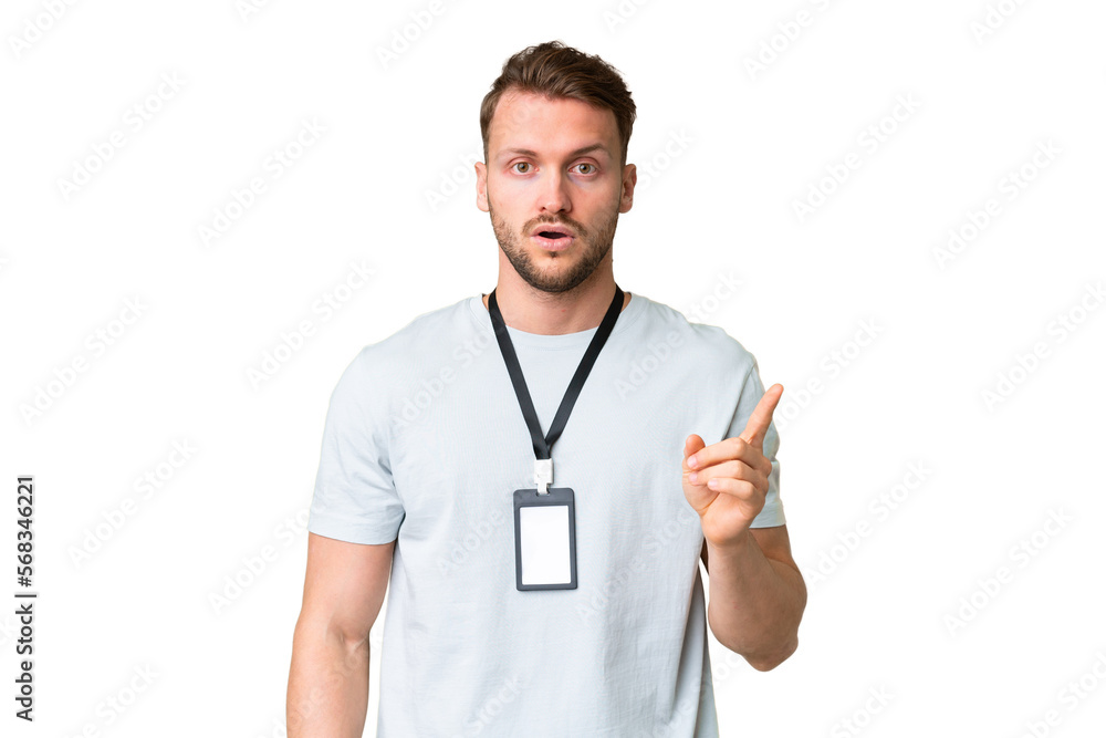 Young caucasian man with ID card over isolated chroma key background intending to realizes the solution while lifting a finger up Young caucasian man with ID card over isolated chroma key background intending to realizes the solution while lifting a finger up