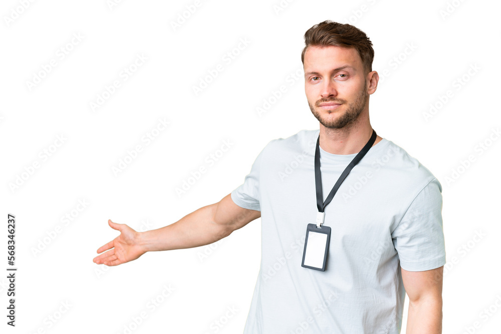 Young caucasian man with ID card over isolated chroma key background extending hands to the side for inviting to come Young caucasian man with ID card over isolated chroma key background extending hands to the side for inviting to come