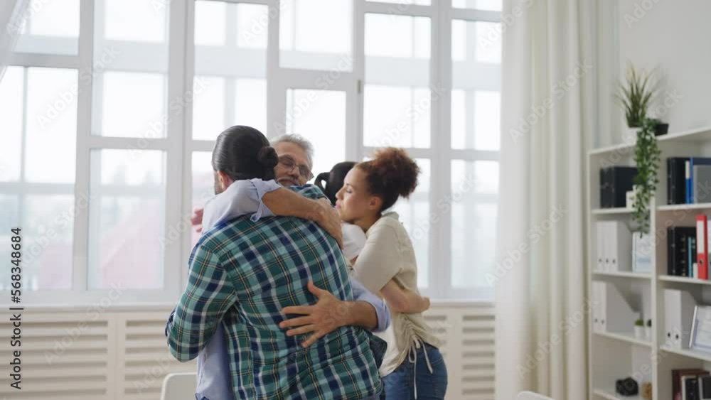 Group of people practicing hug therapy, support group members, recovery plan Group of people practicing hug therapy, support group members, recovery plan
