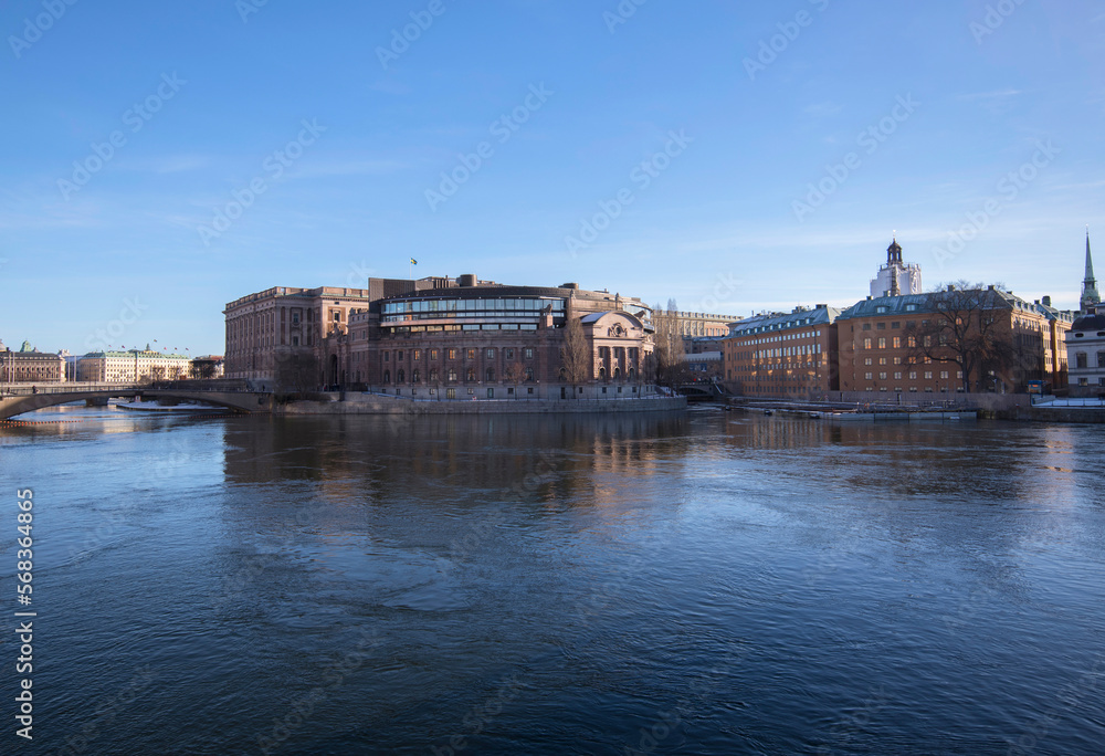 The west side of the parliament house, royal castle and the old town Gamla Stan a sunny snowy winter day in Stockholm