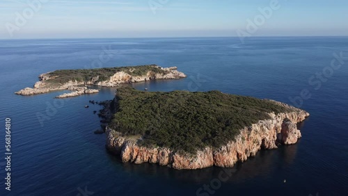 Two uninhabited islands in the Mediterranean from a drone. Uc adalar islands. photo