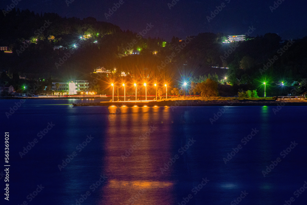view of sidari port by night