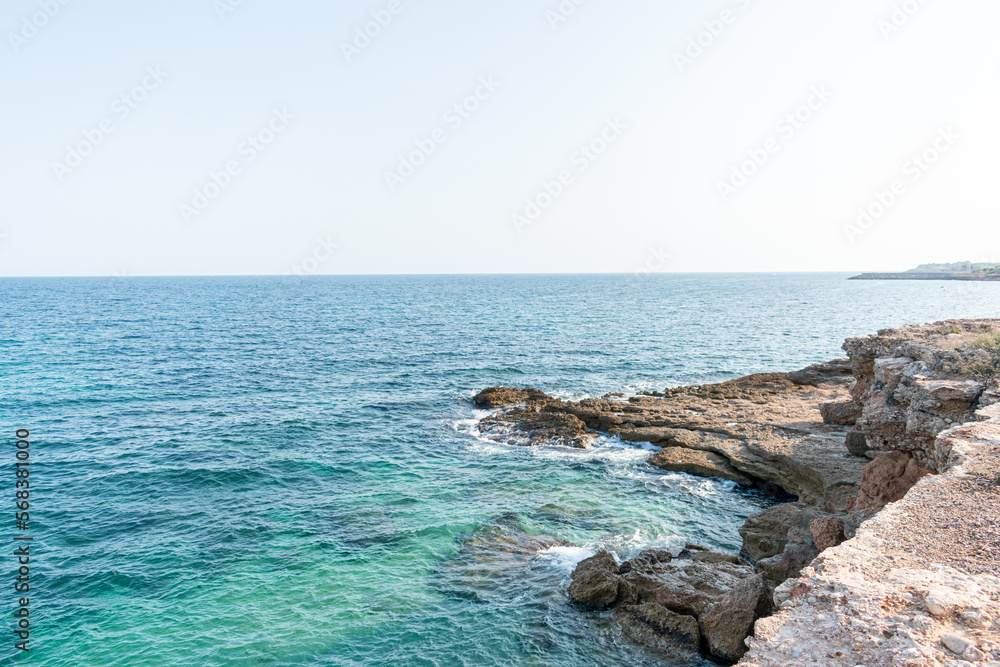 calafatc cove with crystal clear and quiet waters located in tarragona