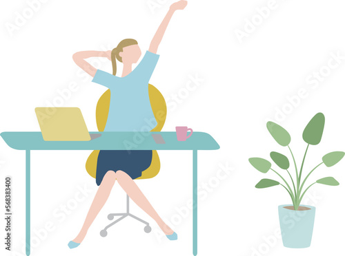 デスクワークの合間に伸びをする女性