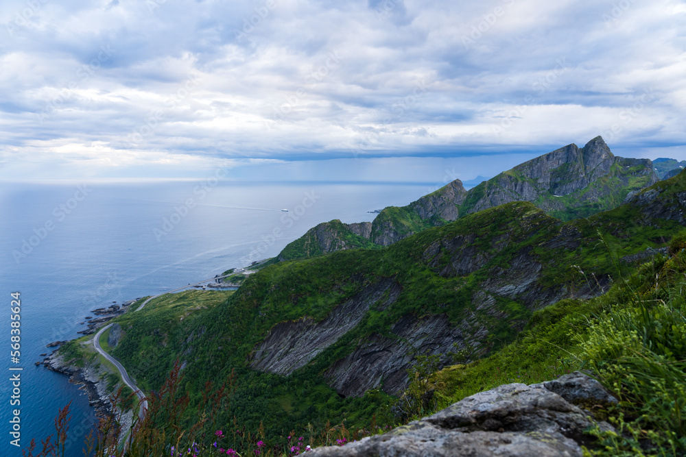 Ocean view from famous Reinebringen hike in the mountains of Lofoten islands in Norway