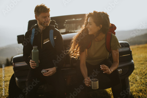 Young couple relaxing on a ...