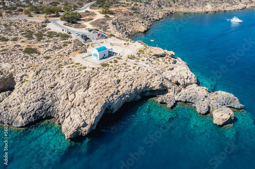 Drone photo of orthodox chapel of Ayioi Anargyroi in Cape Greco National Forest Park in Cyprus photo