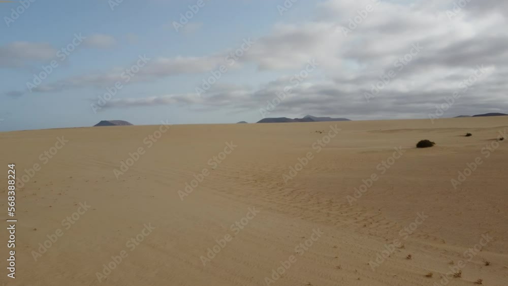 Aerial view of the sandy desert and landscape of Fuerteventura. Native video shot with DJI professional drone. Aerial view of the sandy desert and landscape of Fuerteventura. Native video shot with DJI professional drone.