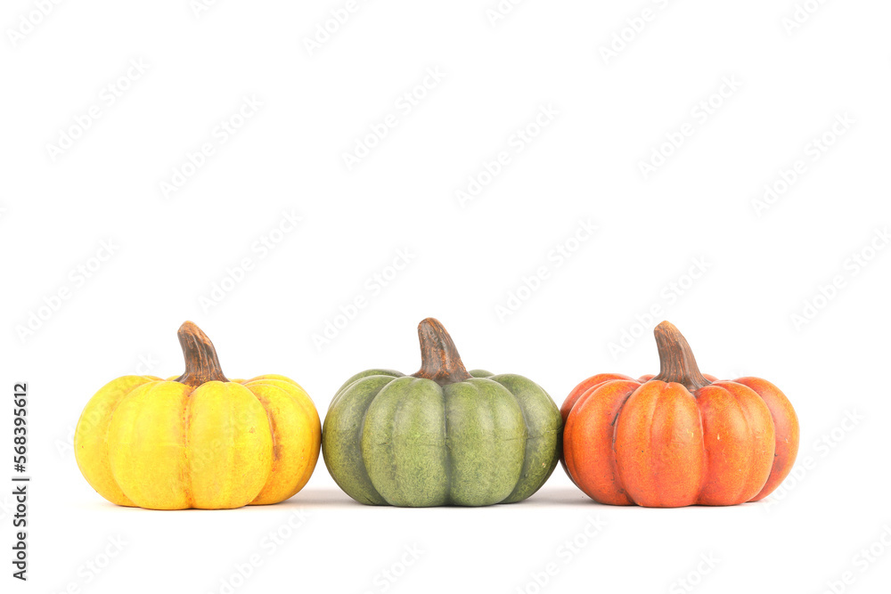 Obraz premium Pumpkins made out of clay isolated on white 