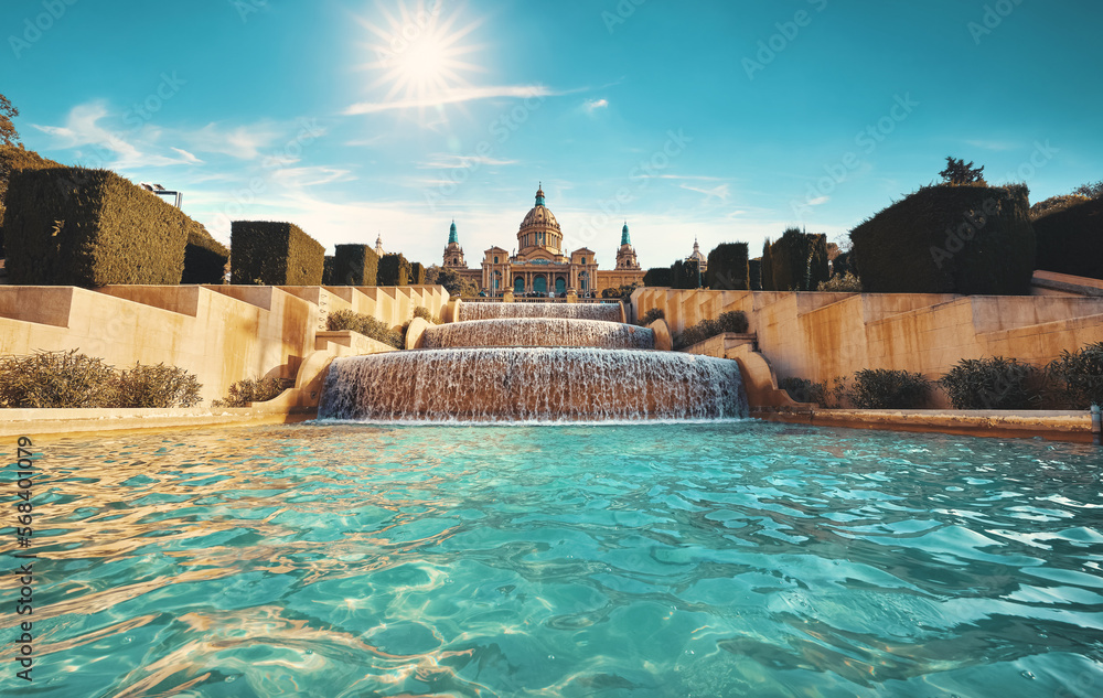 Barcelona, Spain. Magic fountain of Montjuic. National art museum Catalonia. Pool summer day with pure sky