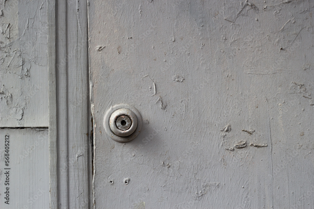 old battered wooden door handle and lock. old battered wooden door handle and lock.