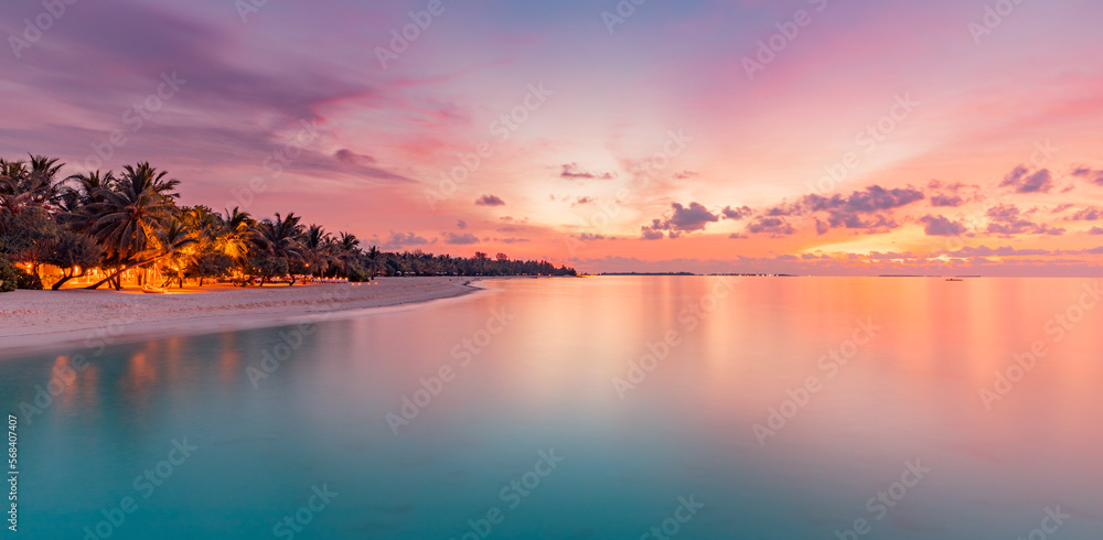 Beautiful panoramic sunset tropical paradise beach. Tranquil summer vacation or holiday landscape. Exotic sunrise beach seaside palm trees silhouette sea bay view inspirational seascape and sky clouds - obrazy, fototapety, plakaty 