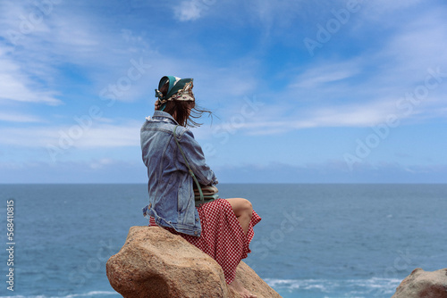 Woman looking after horizon photo