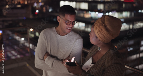 Night  man and black woman with smartphone  connection and social media outdoor. Latino male  Nigerian female and cellphone for communication  share ideas and discussion late evening or online search