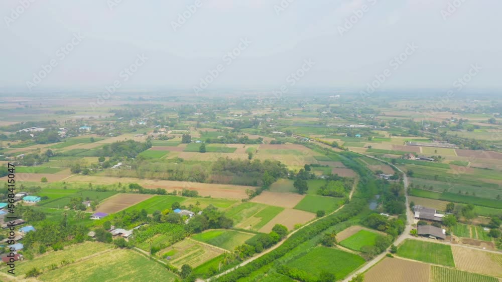 Aerial top view of fresh paddy rice, green agricultural field in countryside or rural area in Asia. Nature landscape background. Aerial top view of fresh paddy rice, green agricultural field in countryside or rural area in Asia. Nature landscape background.