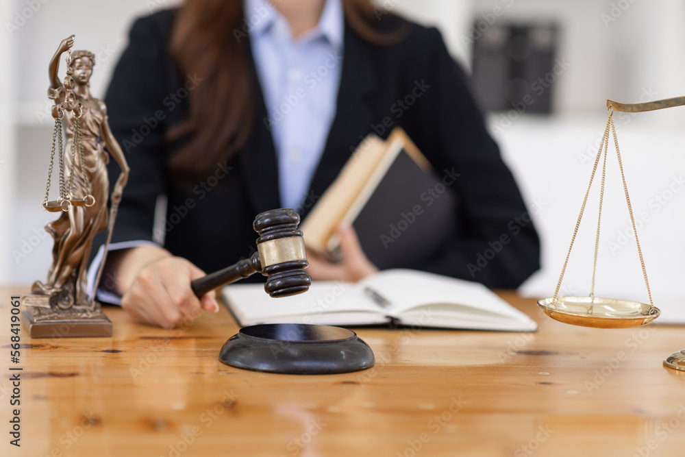 female business woman lawyers working at the law firms. Judge gavel with scales of justice. Legal law, lawyer, documents, advice and justice concept. female business woman lawyers working at the law firms. Judge gavel with scales of justice. Legal law, lawyer, documents, advice and justice concept.