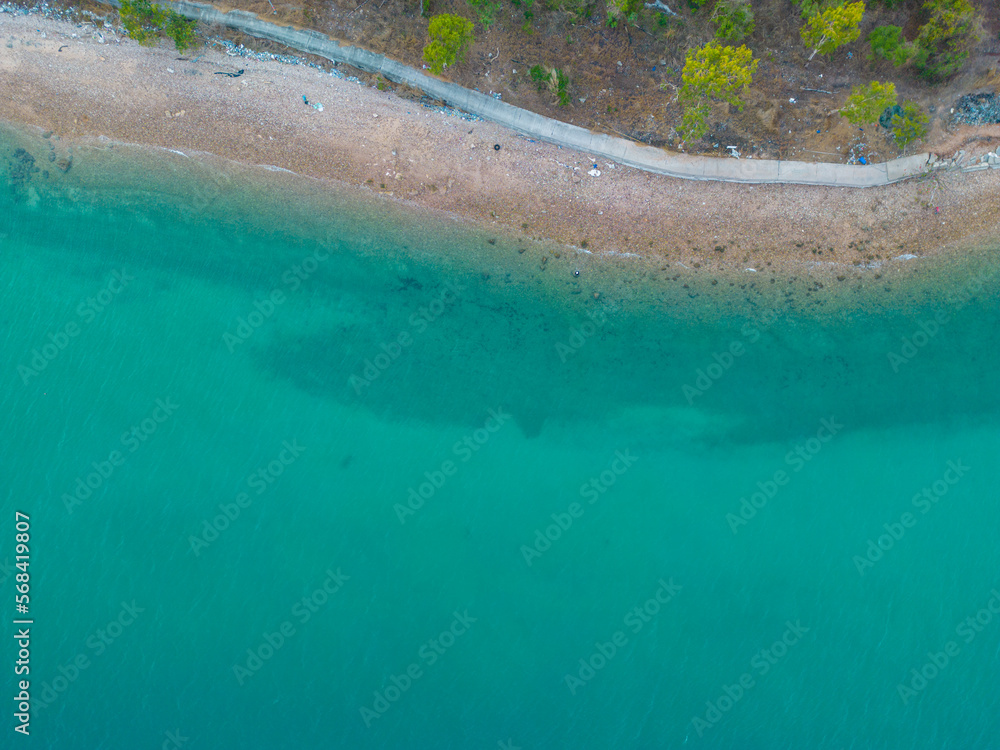 Aerial view sea wave beach with walk way