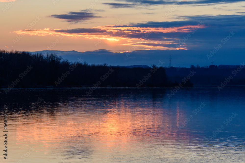 sunrise at the danube river in austria on a winter morning