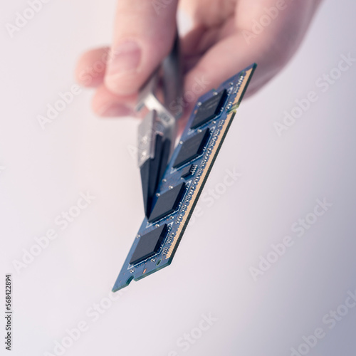 Technician fixing computer. Repair and upgrade concept of laptop. Workshop background