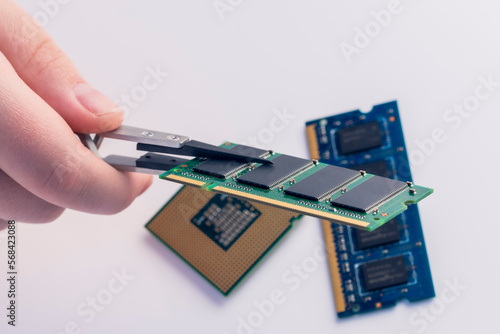 Technician fixing computer. Repair and upgrade concept of laptop. Workshop background