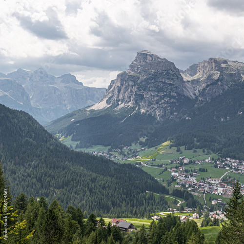 Sassongher mountain (2.625 m), standing out from Gerdenacia range, with Sella Group in the background as seen from the high trail to La Villa , Val Badia, Dolomites, South Tyrol, Italy