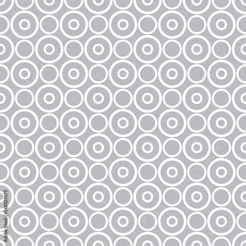 Tile vector pattern with grey polka dots on pastel background