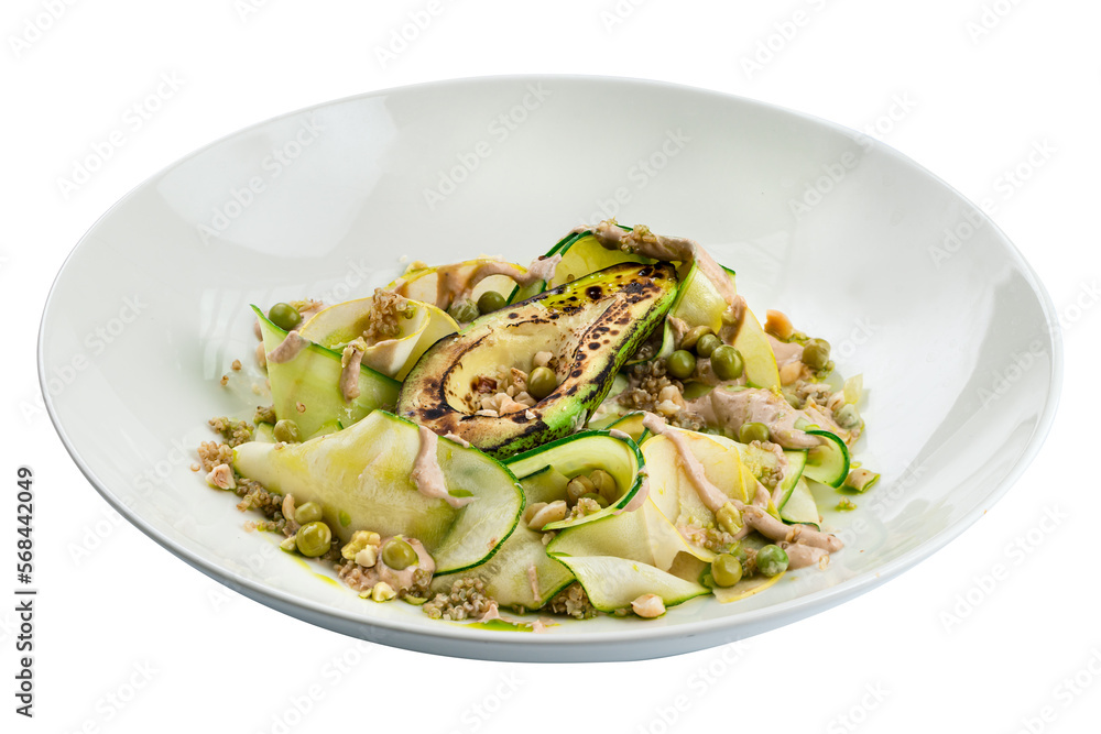 Fresh salad with quinoa, zucchini, avocado, pear, green peas and dressing. Fresh salad with quinoa, zucchini, avocado, pear, green peas and dressing.