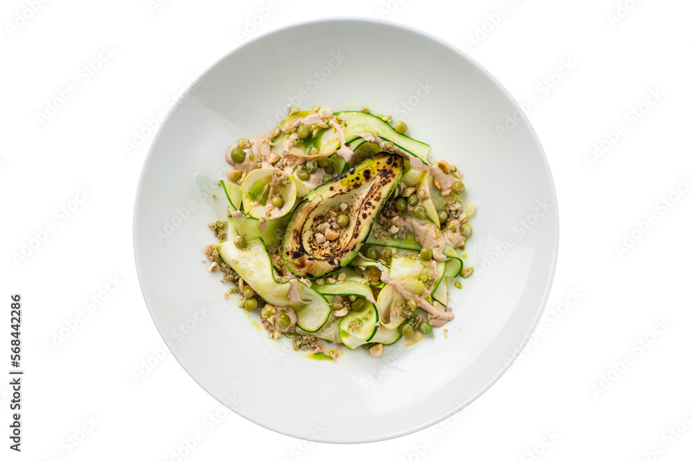 Salad with quinoa, zucchini, avocado, pear, green peas and dressing. Salad with quinoa, zucchini, avocado, pear, green peas and dressing.