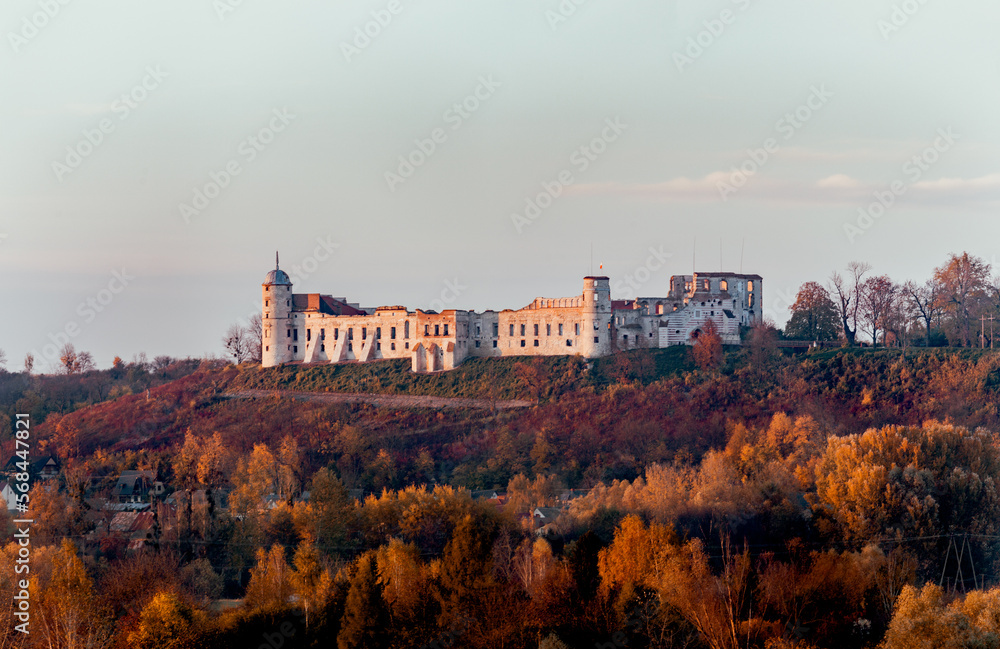 The bank of the Vistula near Kazimierz Dolny, autumn view of the castle hill in the village of Janowiec