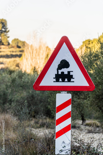 raffic sign indicating a next level crossing photo