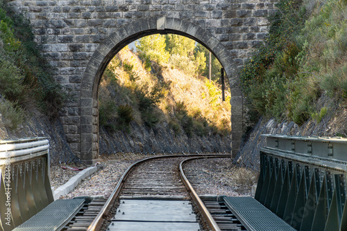 Train tracks passing over a bridge.