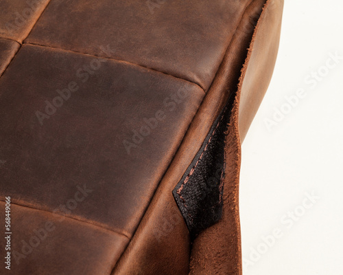 Bild auf Leinwand Closeup of brown leather seat cushion with hook-and-loop fastener