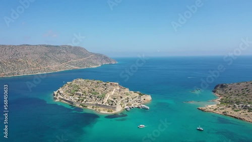 Aerial view of tourist boats on the ruins of the fortress in Spingalonga