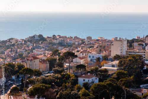 Marseille, France - FEB 28, 2022: Beautiful horizon view with golden sunlight from the coast of Marseille