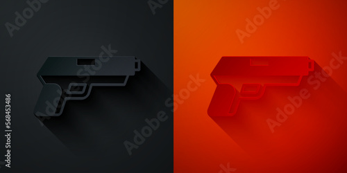 Paper cut Pistol or gun icon isolated on black and red background. Police or military handgun. Small firearm. Paper art style. Vector