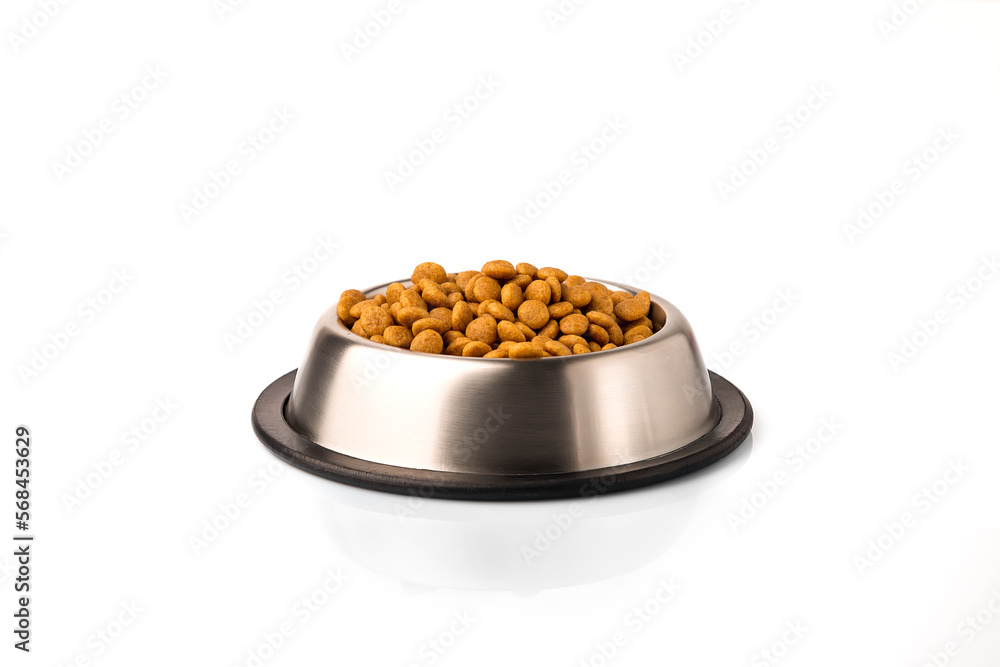 Food for cats and dogs in a bowl isolate on a white background. Food for cats and dogs in a bowl isolate on a white background.