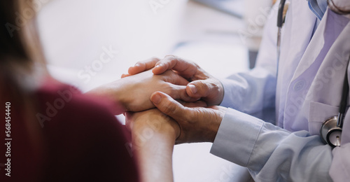 Homecare nursing service and elderly people cardiology healthcare. Close up of young hispanic female doctor nurse check mature caucasian man patient heartbeat using stethoscope during visit